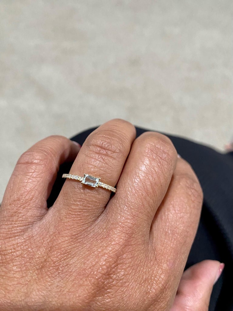 0.27 Ct Aquamarine, Diamond, 14 Karat Yellow Gold Ring