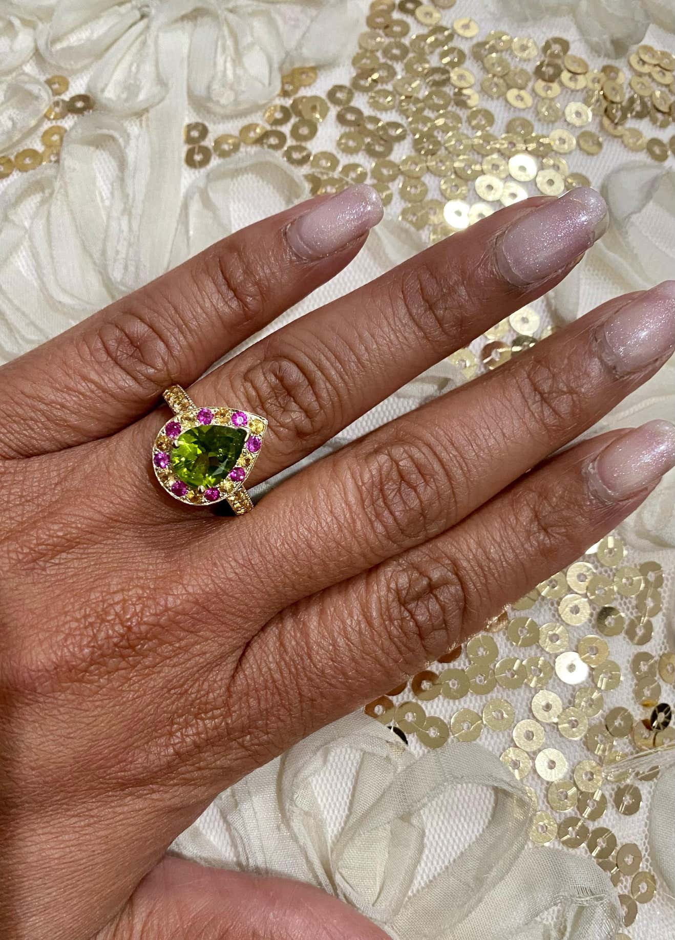 3.16 Ct Peridot, Pink Sapphire Yellow Sapphire 14K Yellow Gold Ring