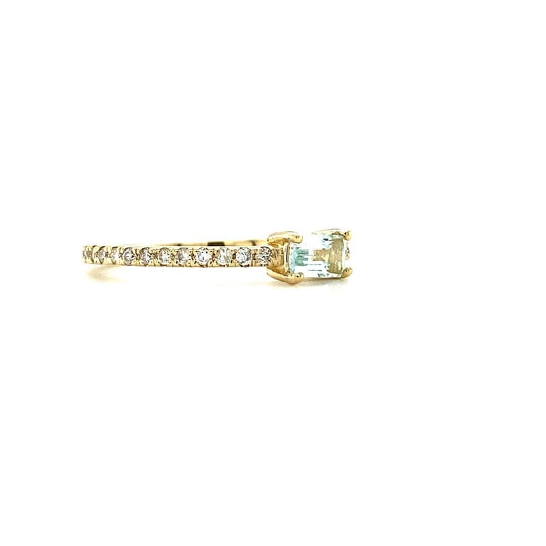 0.27 Ct Aquamarine, Diamond, 14 Karat Yellow Gold Ring