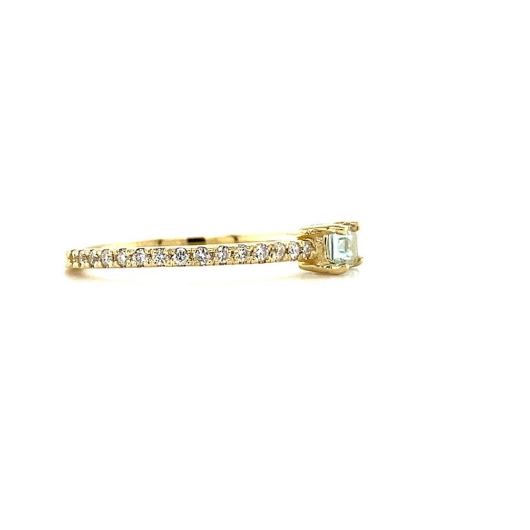 0.27 Ct Aquamarine, Diamond, 14 Karat Yellow Gold Ring